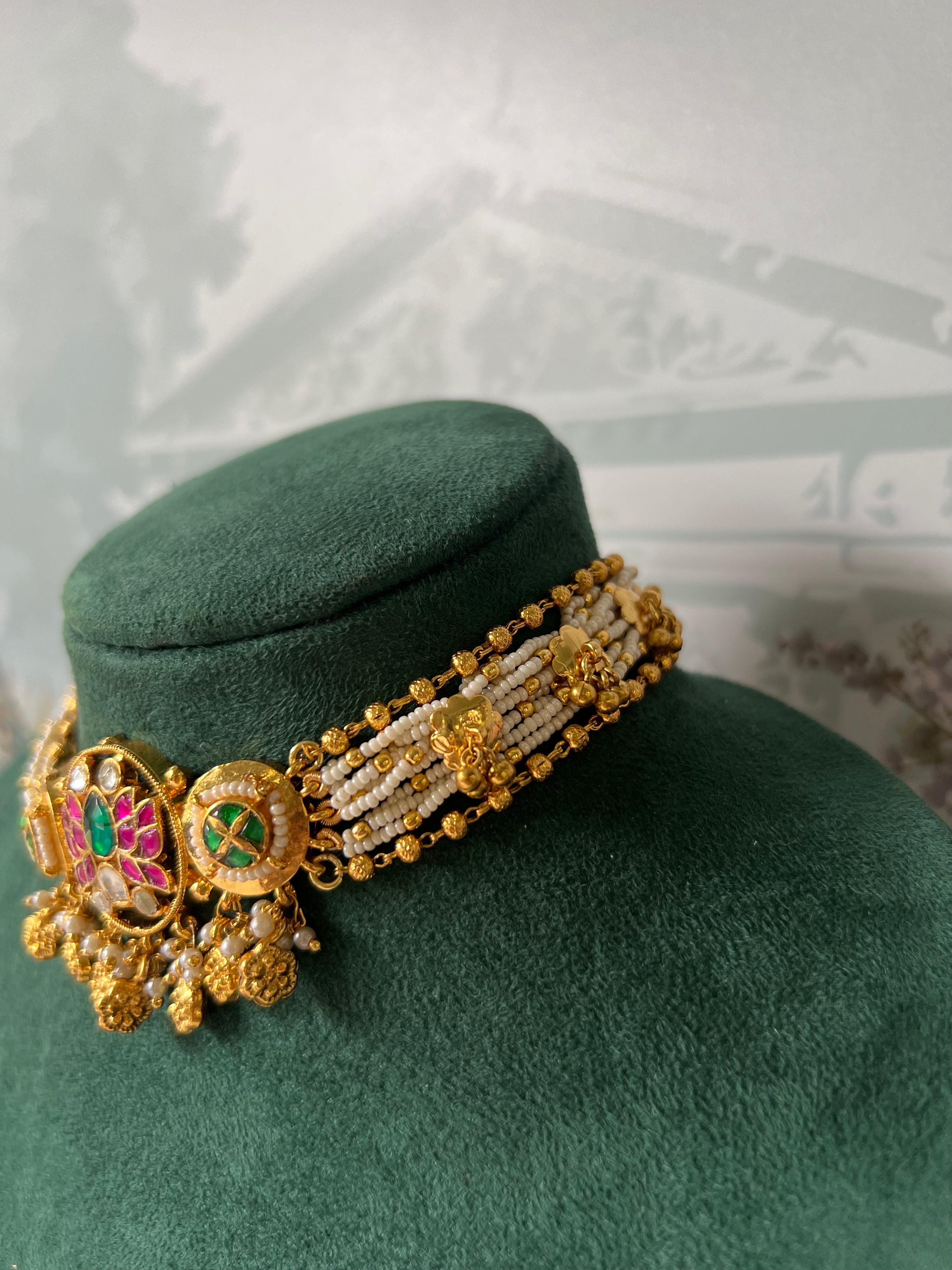 Gold-Plated Floral Meenakari Choker Necklace with Pearl Strands and Kundan Detailing