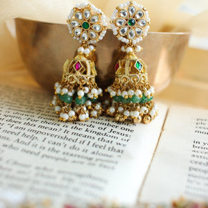 Matching pearl jhumka earrings with emerald bead drops