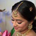 Antique Gold Peacock Maang Tikka – Ruby & Kundan Studded with Floral Charm Drop Chain