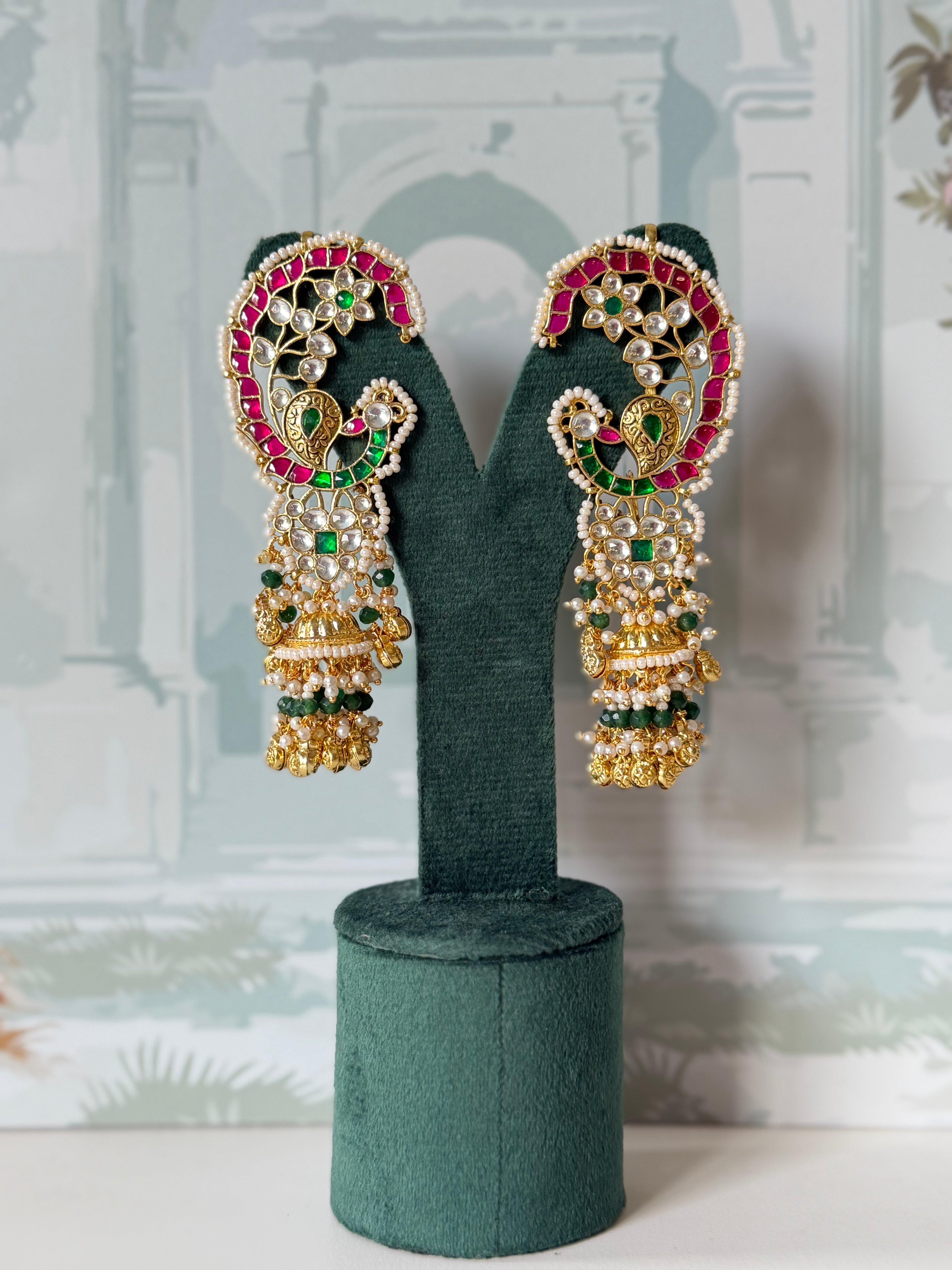 Pink and green kundan peacock ear cuff jhumkas in gold with seed pearl border and pearl fringe
