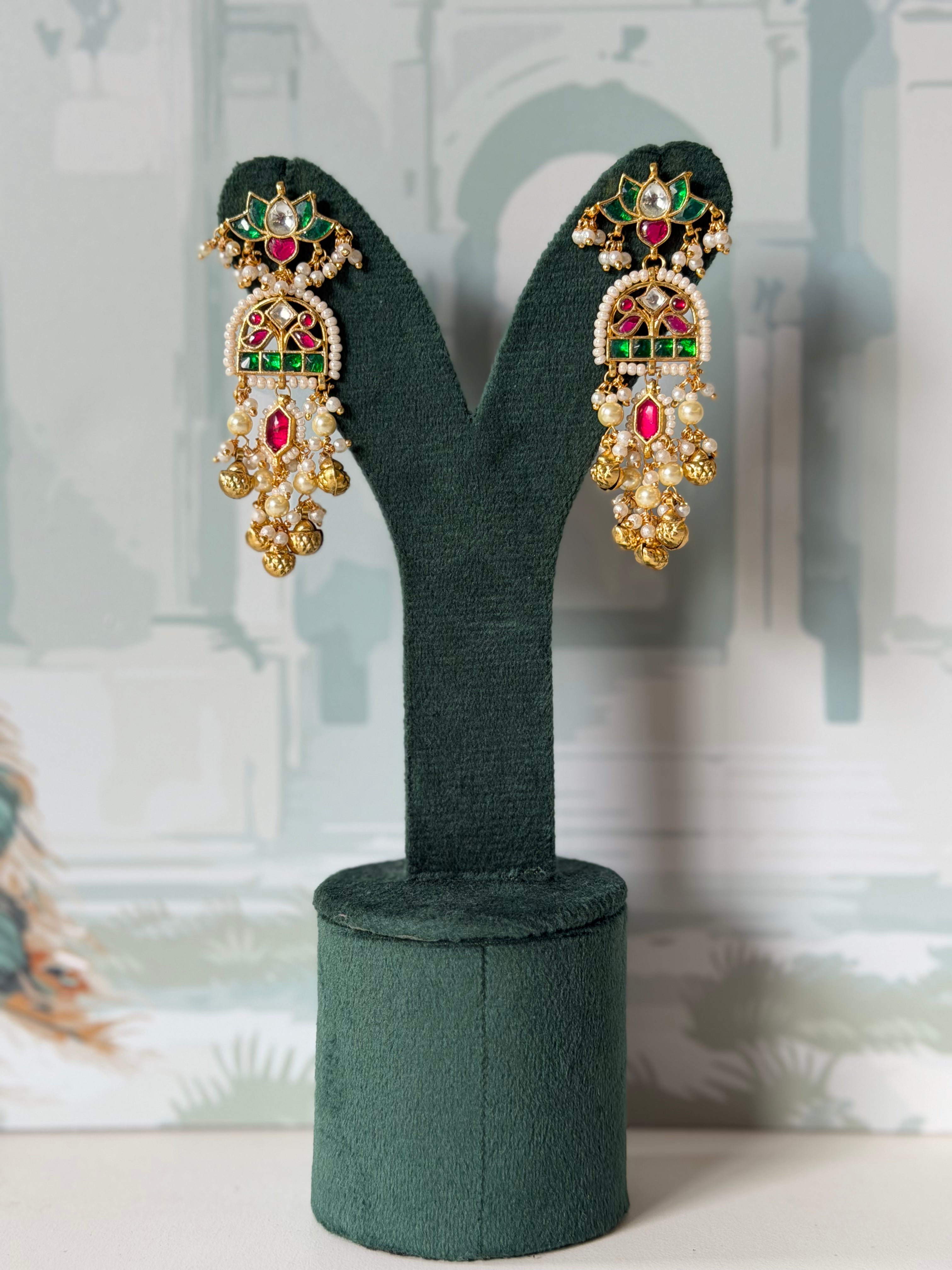 Pink and green kundan lotus drop earrings in gold with pearl-edged arch and ghungroo fringe