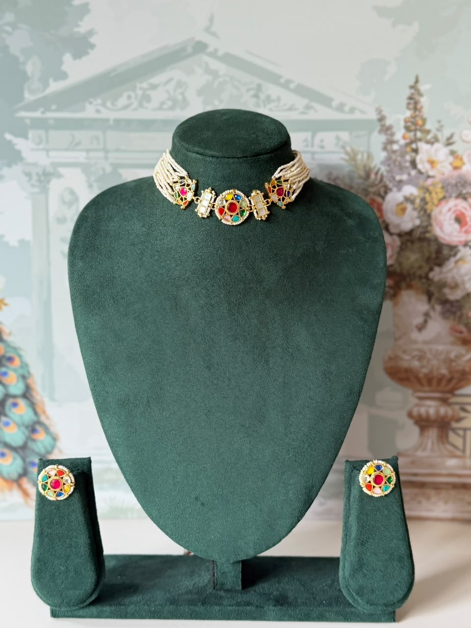 Navratna multicolour kundan seed pearl choker set with mother of pearl links and matching studs