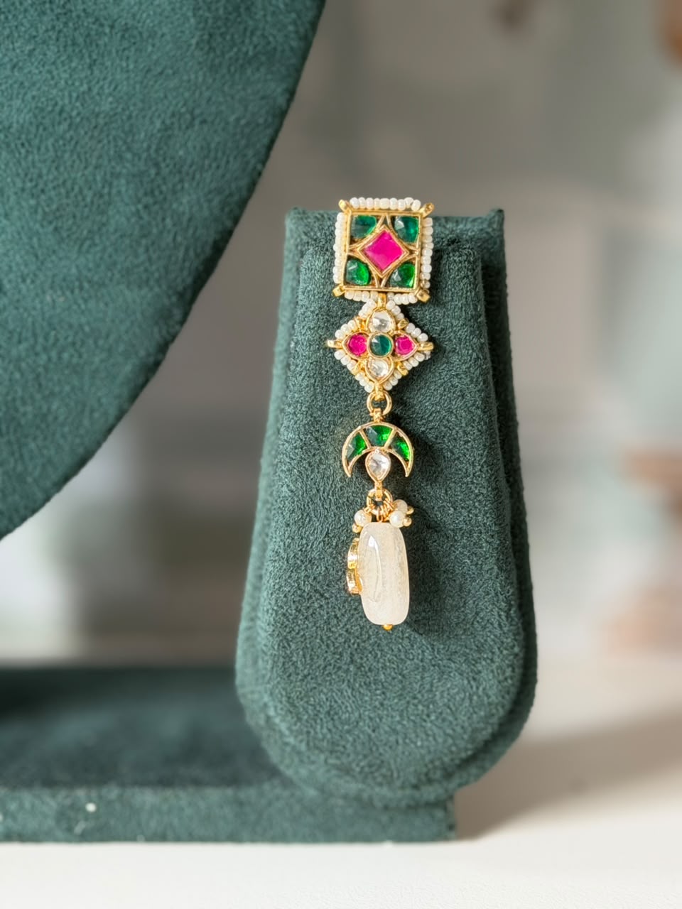 Green and pink jadau choker with kundan teardrop and carved bead drops
