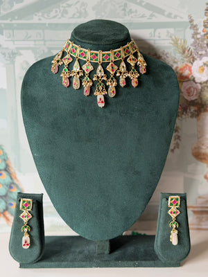 Green and pink jadau long drop earrings with crescent and carved bead