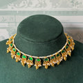 Gold half moon stone choker set on seed pearl strand with gold bead drops and matching earrings