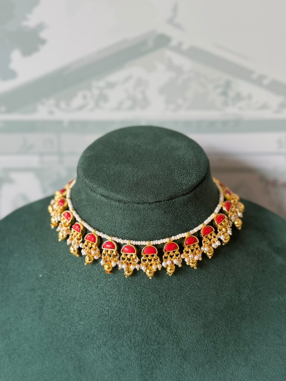 Gold half moon stone choker set on seed pearl strand with gold bead drops and matching earrings