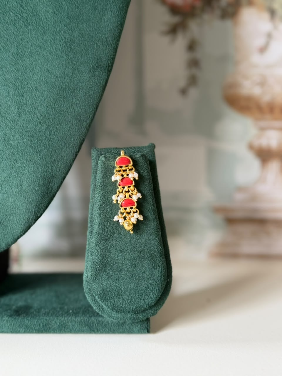 Gold half moon stone choker on seed pearl strand with pearl cluster drops